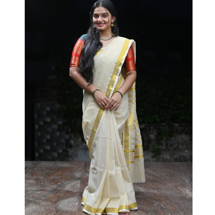 Traditional Kerala off-white tissue saree